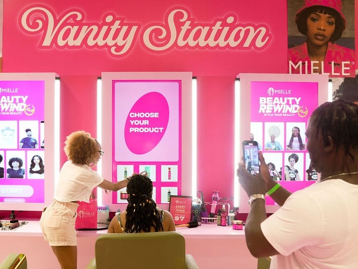 Inside Mielle Organics’ ESSENCE Festival Pop-Up: A 'Beauty Rewind' to Remember